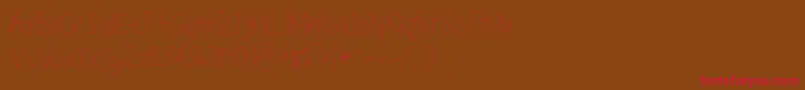 TippytoesSkinny-Schriftart – Rote Schriften auf braunem Hintergrund