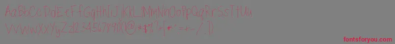 Шрифт TippytoesSkinny – красные шрифты на сером фоне