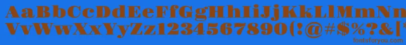 フォントGravitas – 茶色の文字が青い背景にあります。