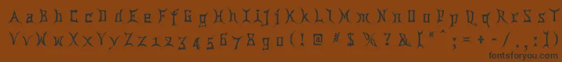 フォントChina ffy – 黒い文字が茶色の背景にあります