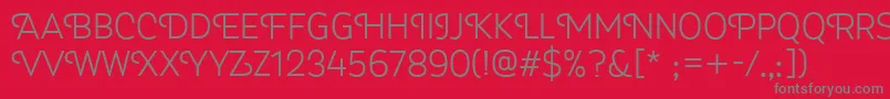 Fonte Myra4fCapsLight – fontes cinzas em um fundo vermelho