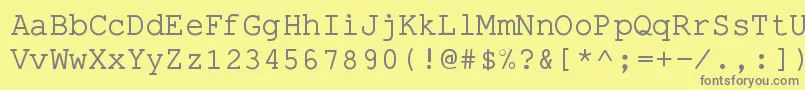 フォントPseudoApl – 黄色の背景に灰色の文字