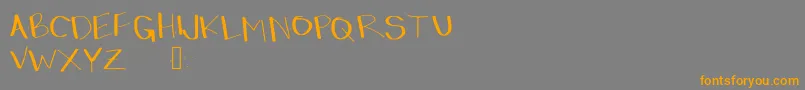 Dressinup Font – Orange Fonts on Gray Background