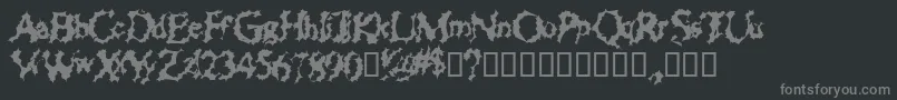 フォントChewedStraw – 黒い背景に灰色の文字