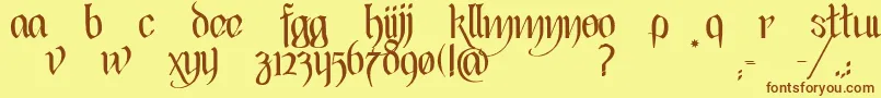 フォントBlackHeartInertia – 茶色の文字が黄色の背景にあります。