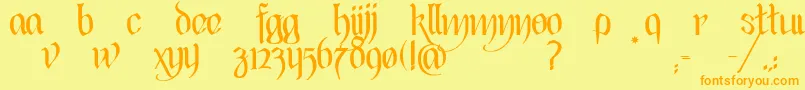 フォントBlackHeartInertia – オレンジの文字が黄色の背景にあります。