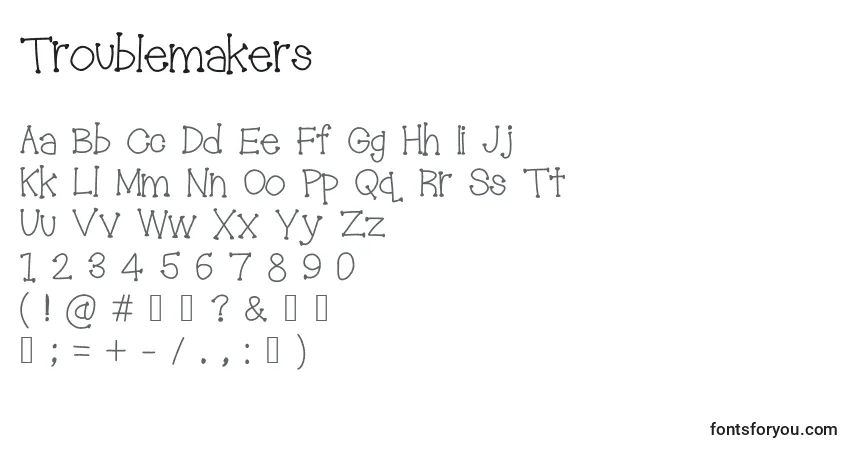 Czcionka Troublemakers – alfabet, cyfry, specjalne znaki