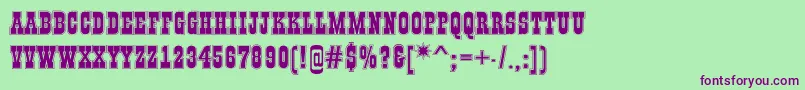 GildiatitulgrRegular Font – Purple Fonts on Green Background