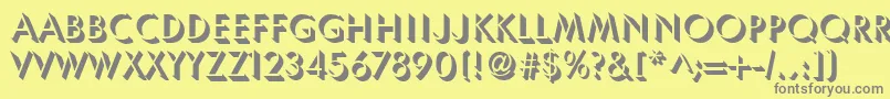 UsambaraRegular-fontti – harmaat kirjasimet keltaisella taustalla