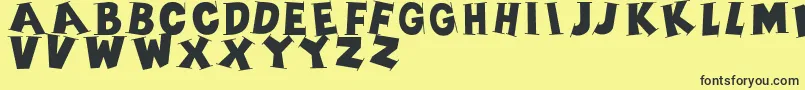 Czcionka Serifscaps – czarne czcionki na żółtym tle