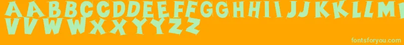 Serifscaps Font – Green Fonts on Orange Background