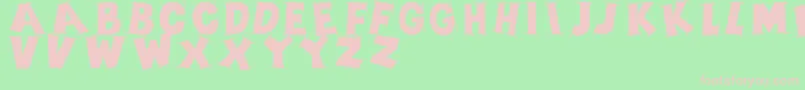 Fonte Serifscaps – fontes rosa em um fundo verde