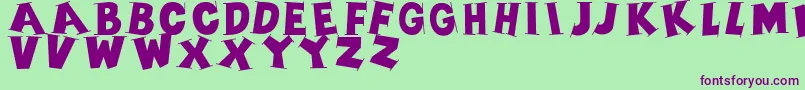 Serifscaps-Schriftart – Violette Schriften auf grünem Hintergrund