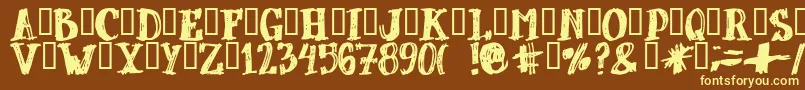 Dubbel-fontti – keltaiset fontit ruskealla taustalla