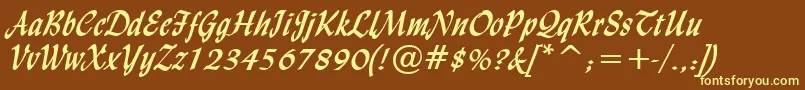 LyndaCursiveBold-fontti – keltaiset fontit ruskealla taustalla