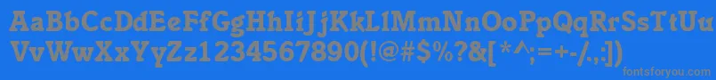 フォントInclinatblackssk – 青い背景に灰色の文字
