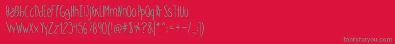 フォントSkinnycookiesbold – 赤い背景に灰色の文字