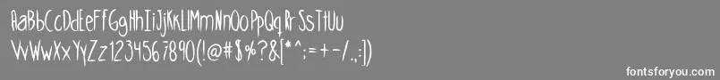 フォントSkinnycookiesbold – 灰色の背景に白い文字