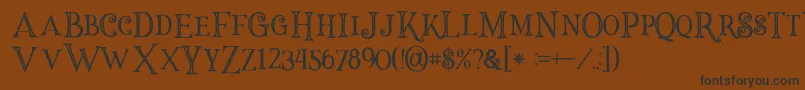 Halloweninline-Schriftart – Schwarze Schriften auf braunem Hintergrund