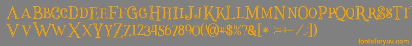 Halloweninline-Schriftart – Orangefarbene Schriften auf grauem Hintergrund