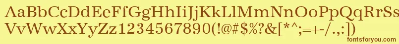 AntiquastdRegular Font – Brown Fonts on Yellow Background