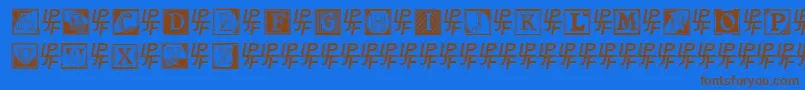 フォントShrewsburyInitials – 茶色の文字が青い背景にあります。