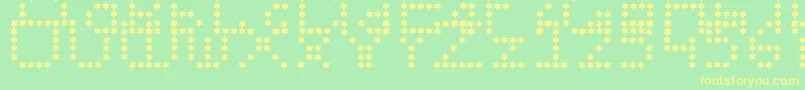 フォントWendymupke – 黄色の文字が緑の背景にあります