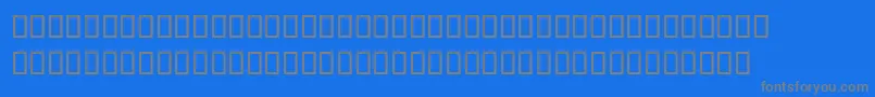 フォントMagedLf – 青い背景に灰色の文字