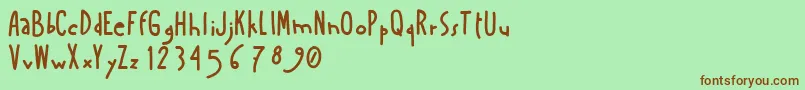 Amanoboldensada Font – Brown Fonts on Green Background