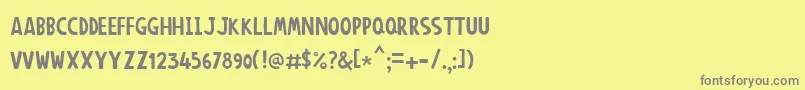 フォントAnonimround – 黄色の背景に灰色の文字