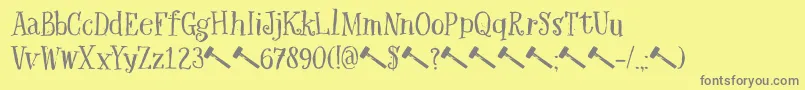 Fonte DkHexenhammer – fontes cinzas em um fundo amarelo