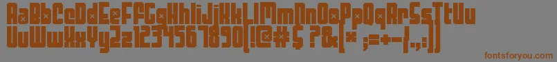 フォントThreelambda – 茶色の文字が灰色の背景にあります。