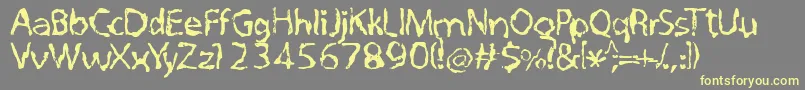 Quovadisquasimodo Font – Yellow Fonts on Gray Background