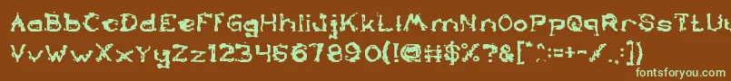 フォントTheLazyDogBold – 緑色の文字が茶色の背景にあります。