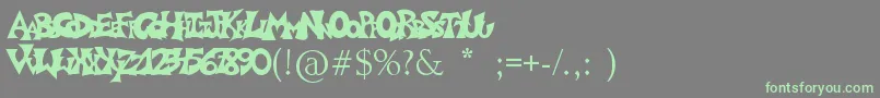 Graffitiposter Font – Green Fonts on Gray Background