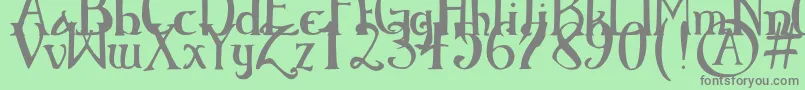ElementaryGothicBookhand Font – Gray Fonts on Green Background