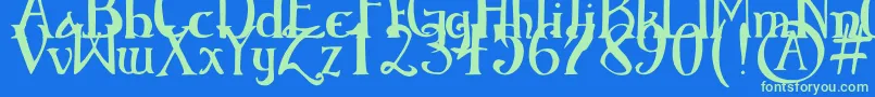 ElementaryGothicBookhand Font – Green Fonts on Blue Background
