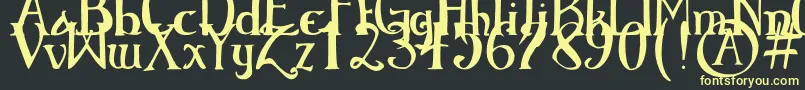 ElementaryGothicBookhand Font – Yellow Fonts on Black Background