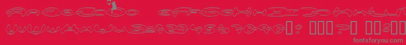 Fonte AlienationOutline – fontes cinzas em um fundo vermelho