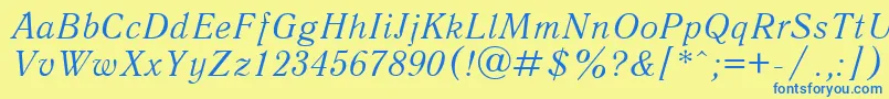 QuantantiquacItalic Font – Blue Fonts on Yellow Background