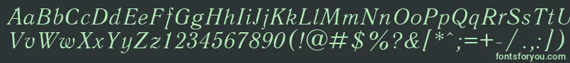 Czcionka QuantantiquacItalic – zielone czcionki na czarnym tle