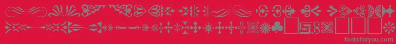 フォントOrnamentTmNormal – 赤い背景に灰色の文字
