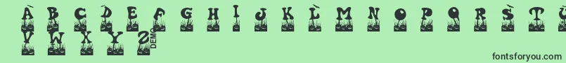 Halovendemo-Schriftart – Schwarze Schriften auf grünem Hintergrund