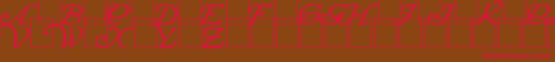 WrennInitialsBold Font – Red Fonts on Brown Background