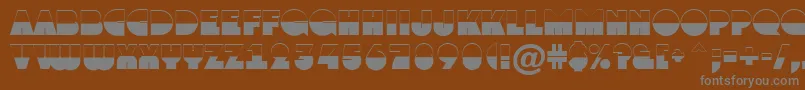 Grotob1-Schriftart – Graue Schriften auf braunem Hintergrund