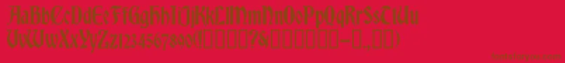 Romvelc Font – Brown Fonts on Red Background