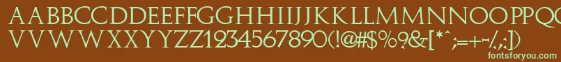 フォントImplicitcapsssk – 緑色の文字が茶色の背景にあります。