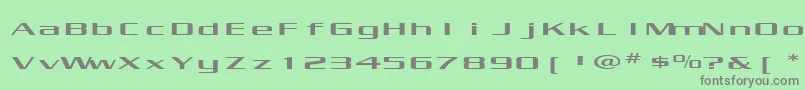 KubraExtended-fontti – harmaat kirjasimet vihreällä taustalla