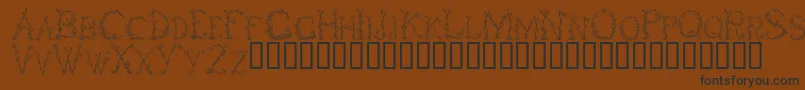 FleursDeLiane-Schriftart – Schwarze Schriften auf braunem Hintergrund