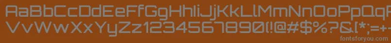 OrbitronMedium-Schriftart – Graue Schriften auf braunem Hintergrund